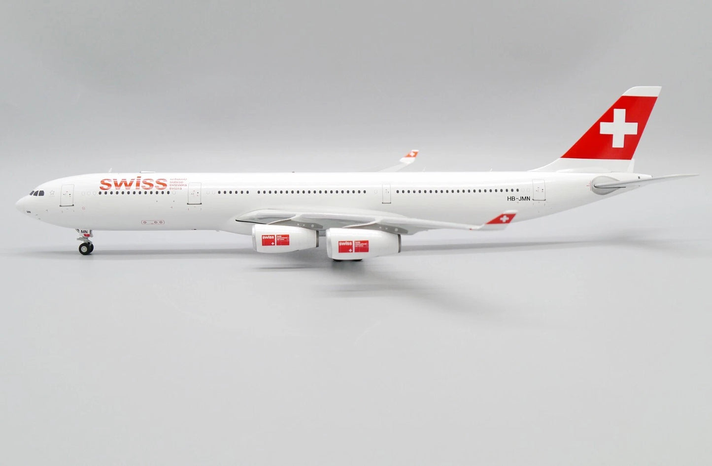 JC WINGS A340-300 SWISS OC REG: HB-JMN