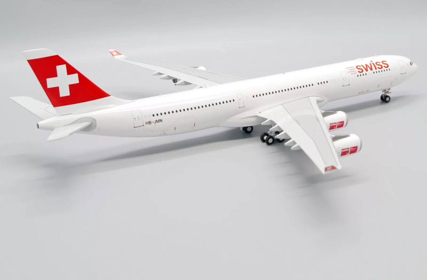 JC WINGS A340-300 SWISS OC REG: HB-JMN