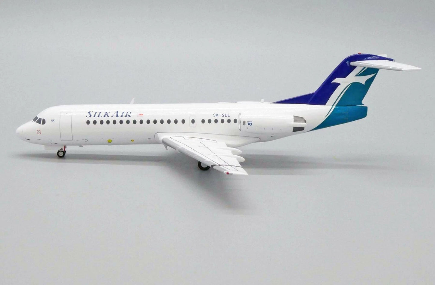 JC WINGS FOKKER 70 SILKAIR REG: 9V-SLL
