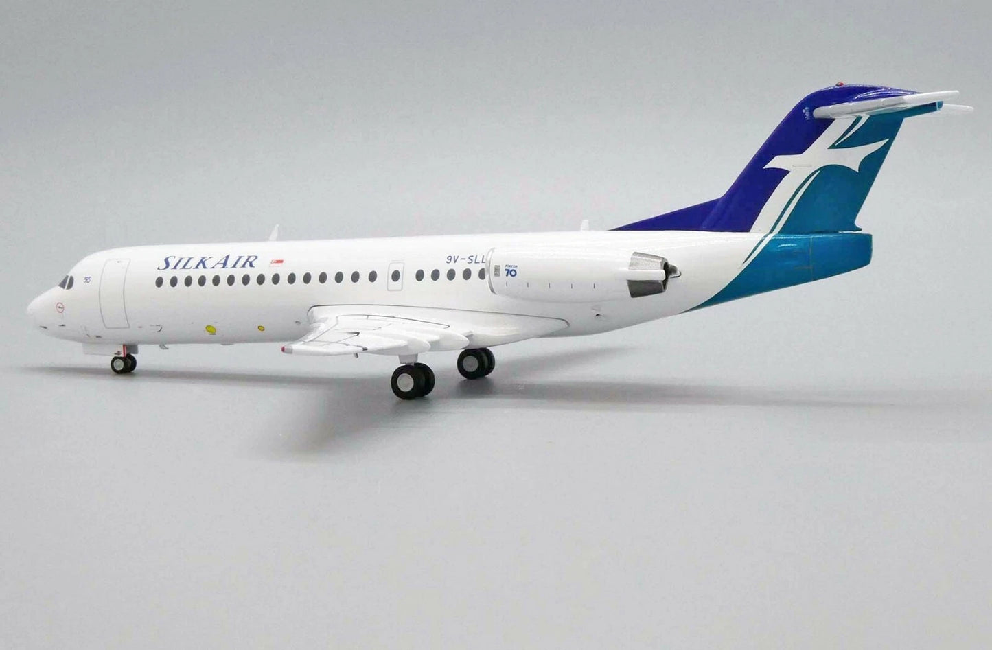JC WINGS FOKKER 70 SILKAIR REG: 9V-SLL
