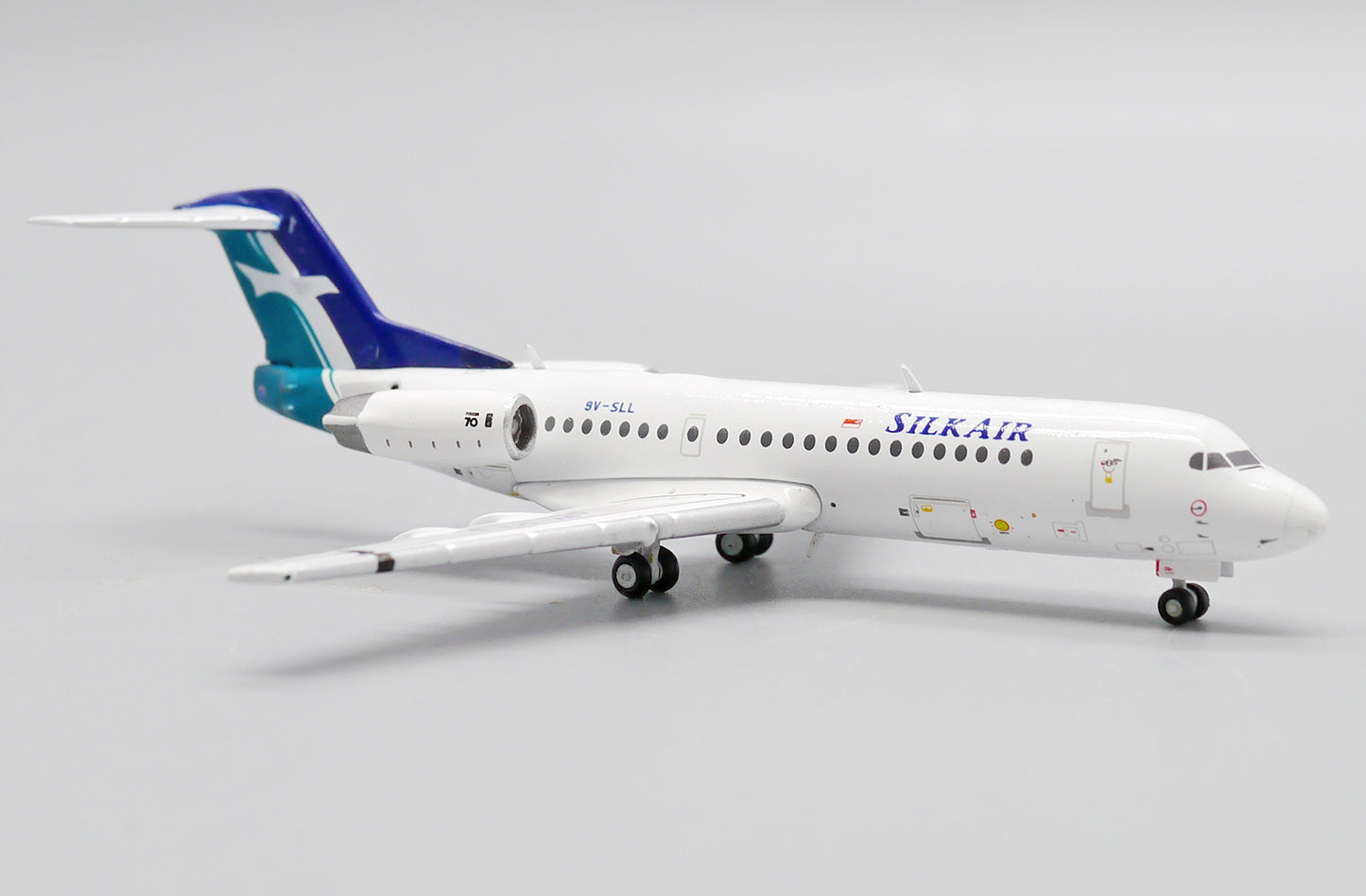 JC WINGS FOKKER 70 SILKAIR REG: 9V-SLL