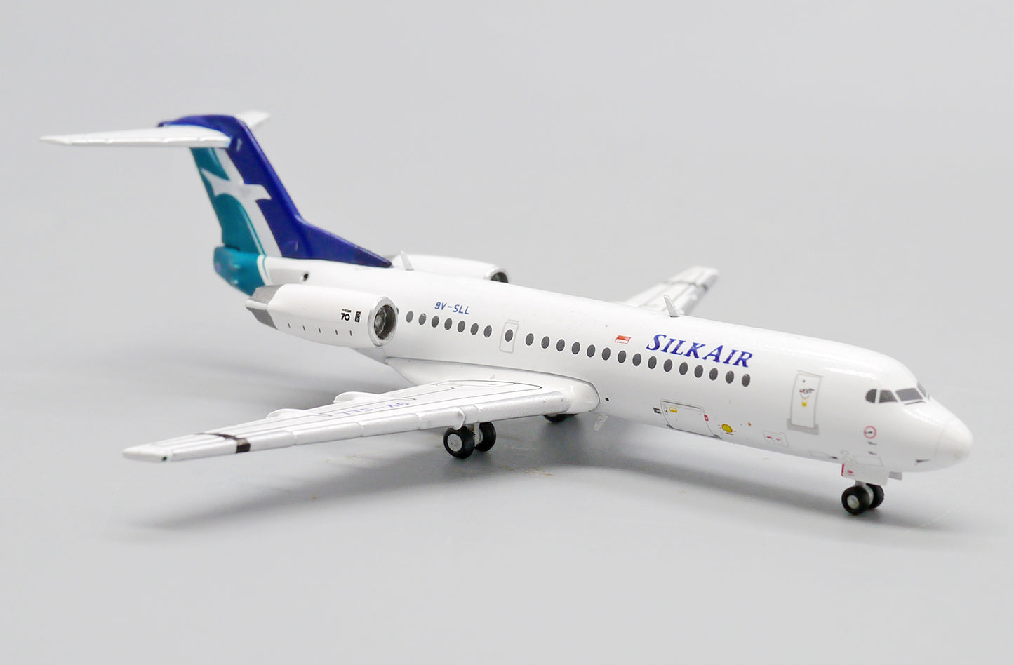 JC WINGS FOKKER 70 SILKAIR REG: 9V-SLL