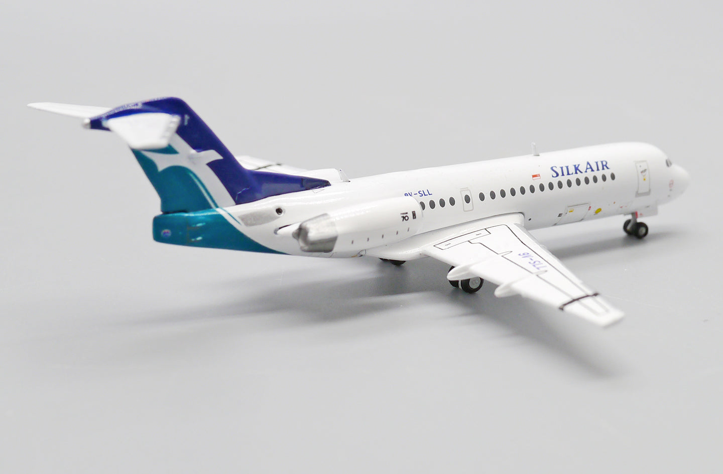 JC WINGS FOKKER 70 SILKAIR REG: 9V-SLL