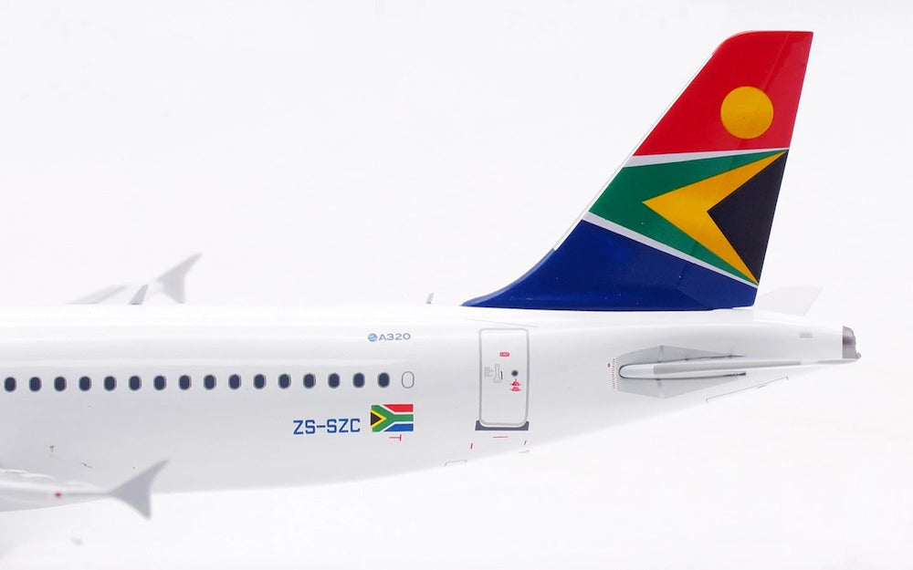 INFLIGHT 200 A320-232 SOUTH AFRICAN AIRWAYS REG: ZS-SZC WITH STAND