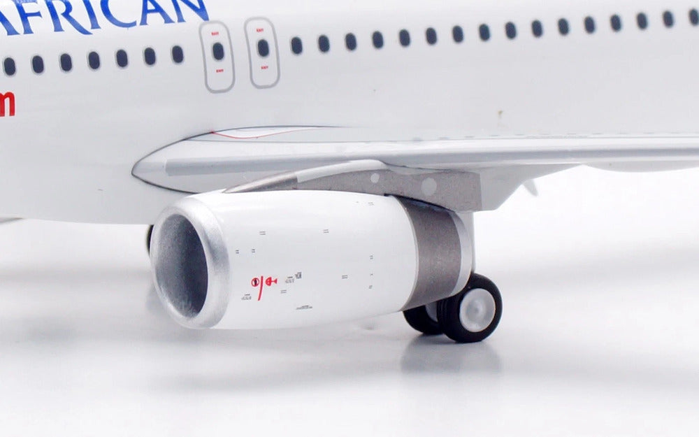 INFLIGHT 200 A320-232 SOUTH AFRICAN AIRWAYS REG: ZS-SZC WITH STAND