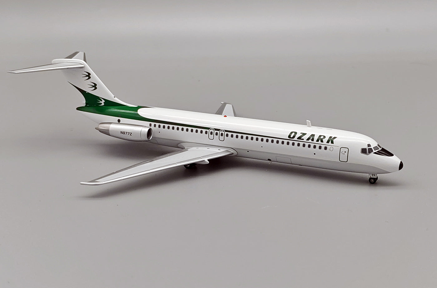 INFLIGHT 200 DC-9-31 OZARK AIR LINES REG: N977Z WITH STAND
