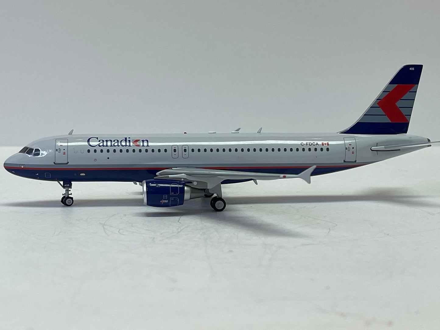 INFLIGHT A320-200 CANADIAN AIRLINES REG: C-FDCA WITH STAND