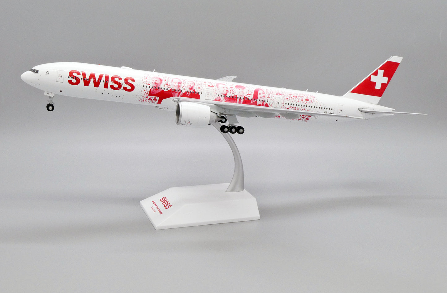 JC WINGS B777-300ER SWISS "FACES OF SWISS" REG: HB-JNA