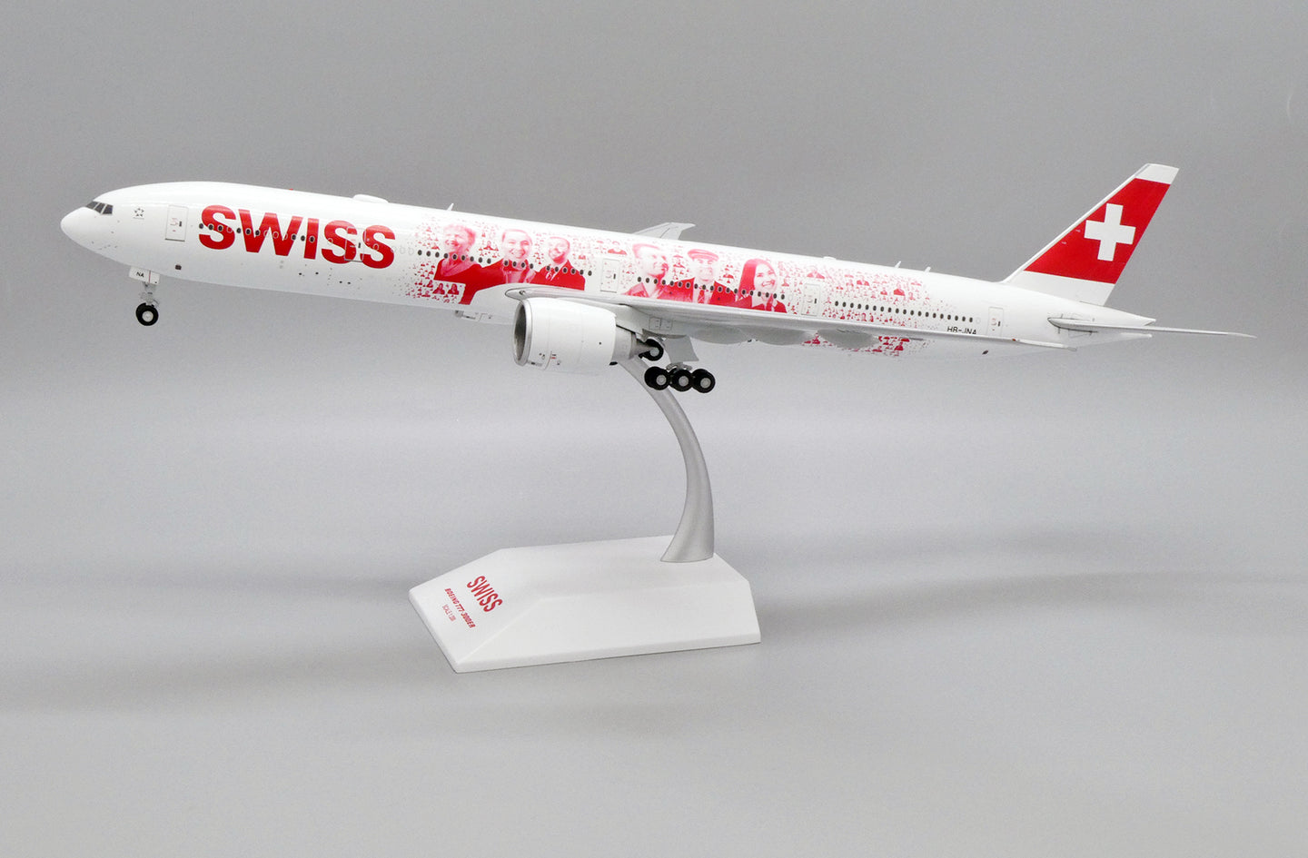 JC WINGS B777-300ER SWISS "FACES OF SWISS" REG: HB-JNA