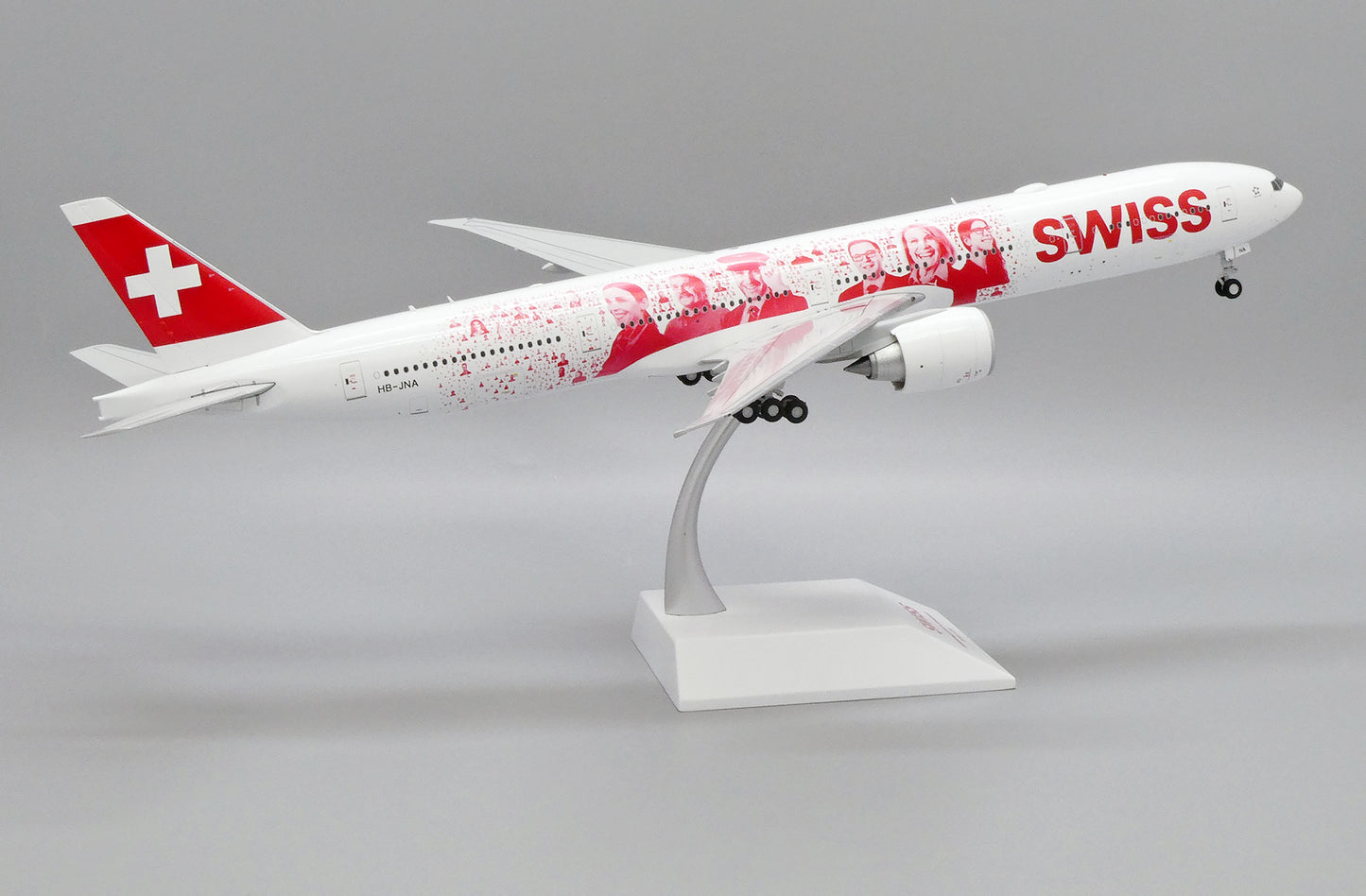 JC WINGS B777-300ER SWISS "FACES OF SWISS" REG: HB-JNA
