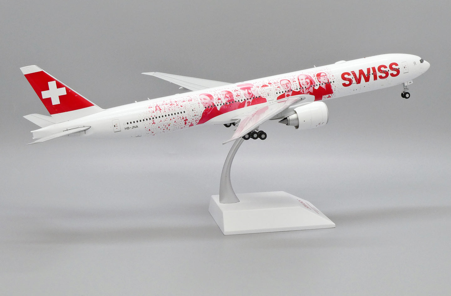 JC WINGS B777-300ER SWISS "FACES OF SWISS" REG: HB-JNA