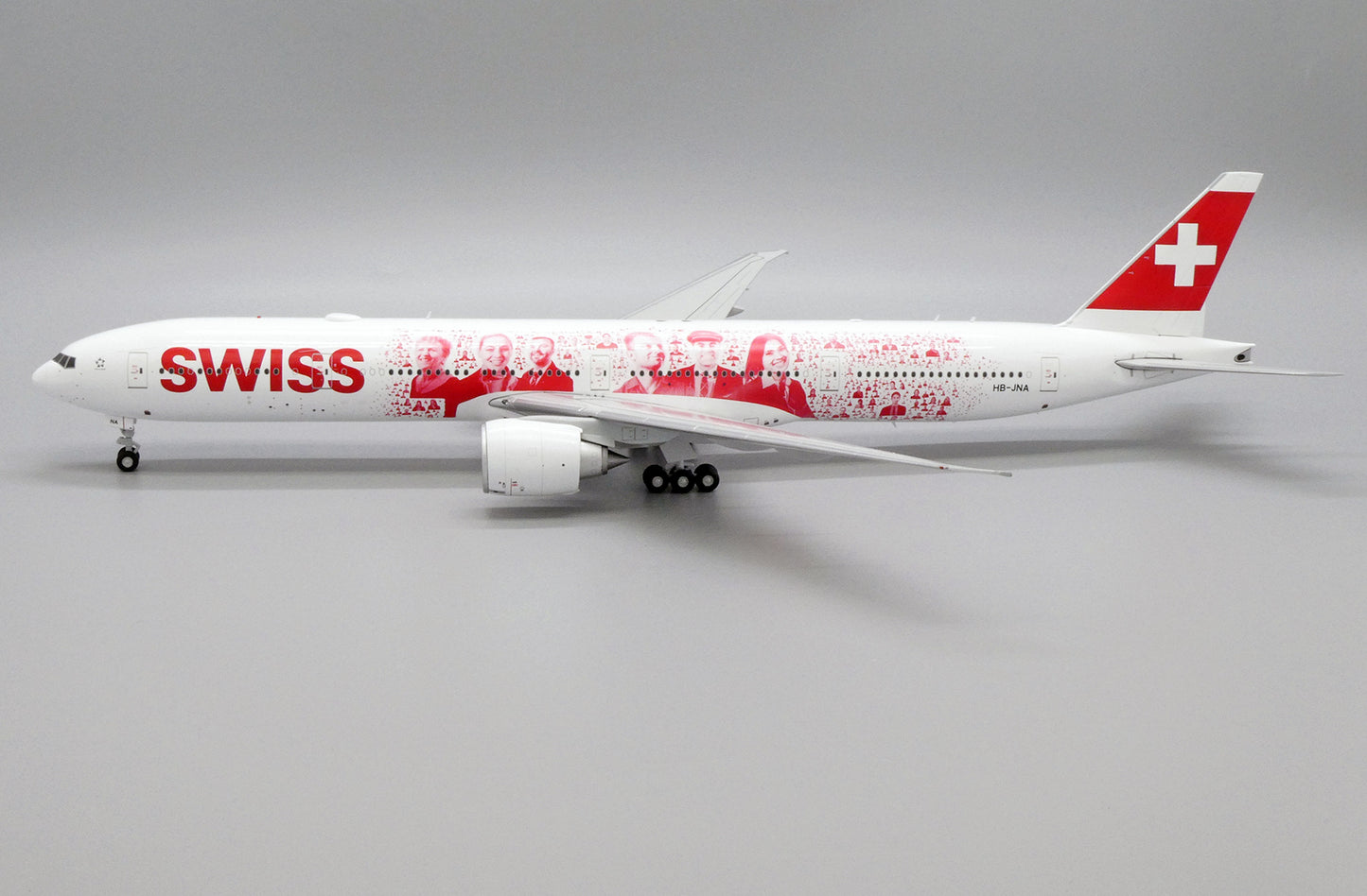JC WINGS B777-300ER SWISS "FACES OF SWISS" REG: HB-JNA