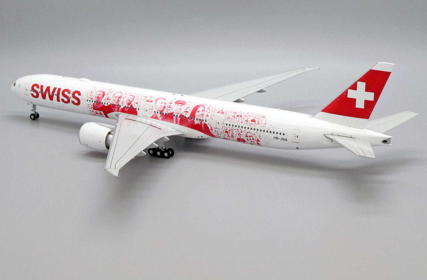 JC WINGS B777-300ER SWISS "FACES OF SWISS" REG: HB-JNA