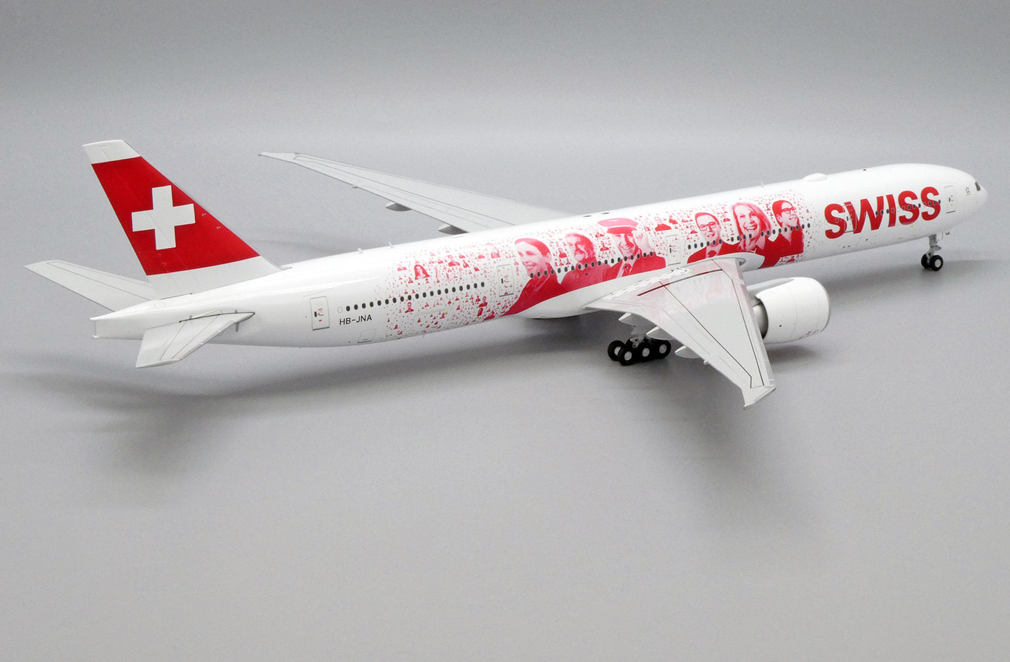 JC WINGS B777-300ER SWISS "FACES OF SWISS" REG: HB-JNA