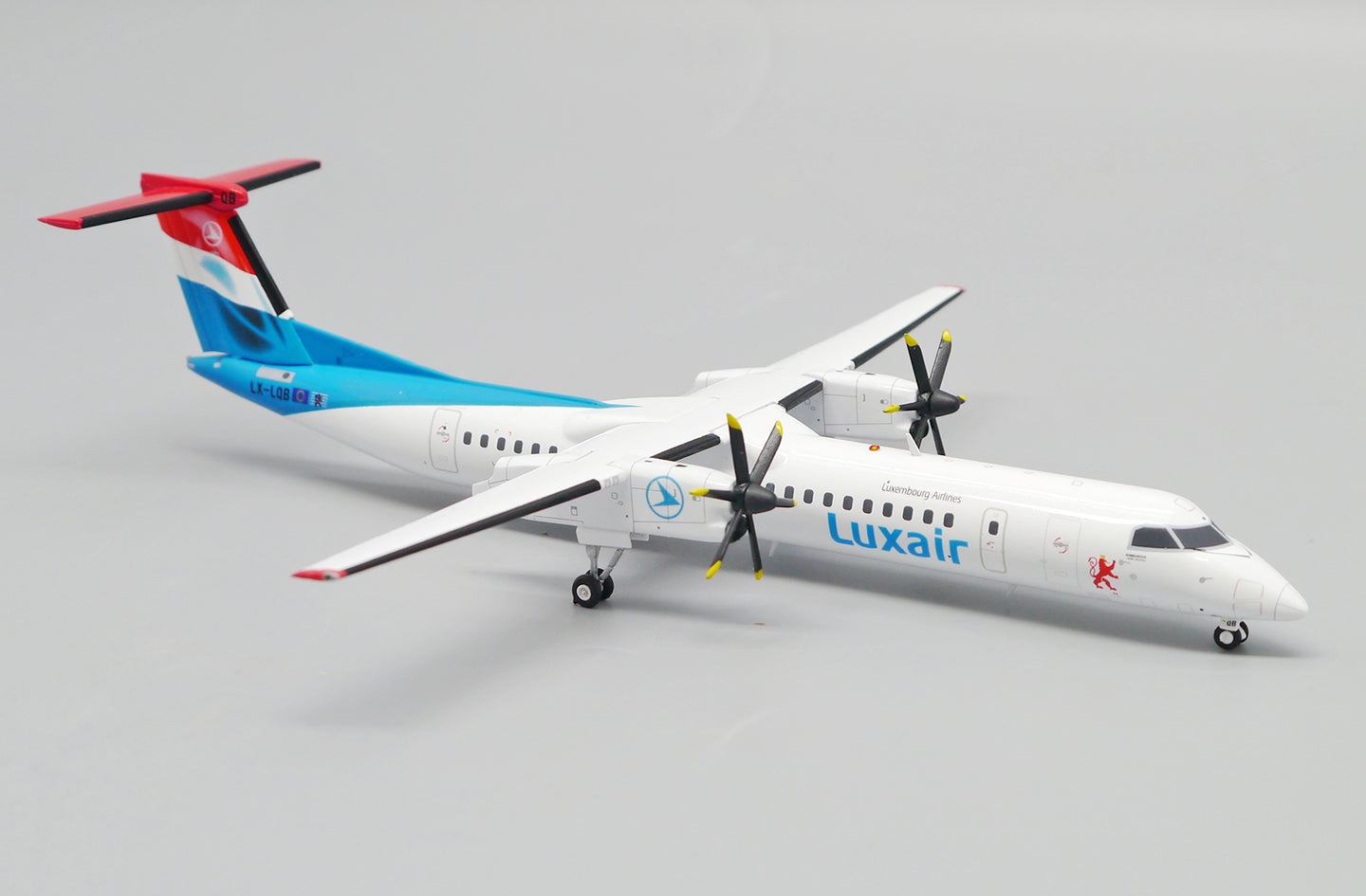 JC WINGS DASH 8-Q400 LUXAIR REG: LX-LQB