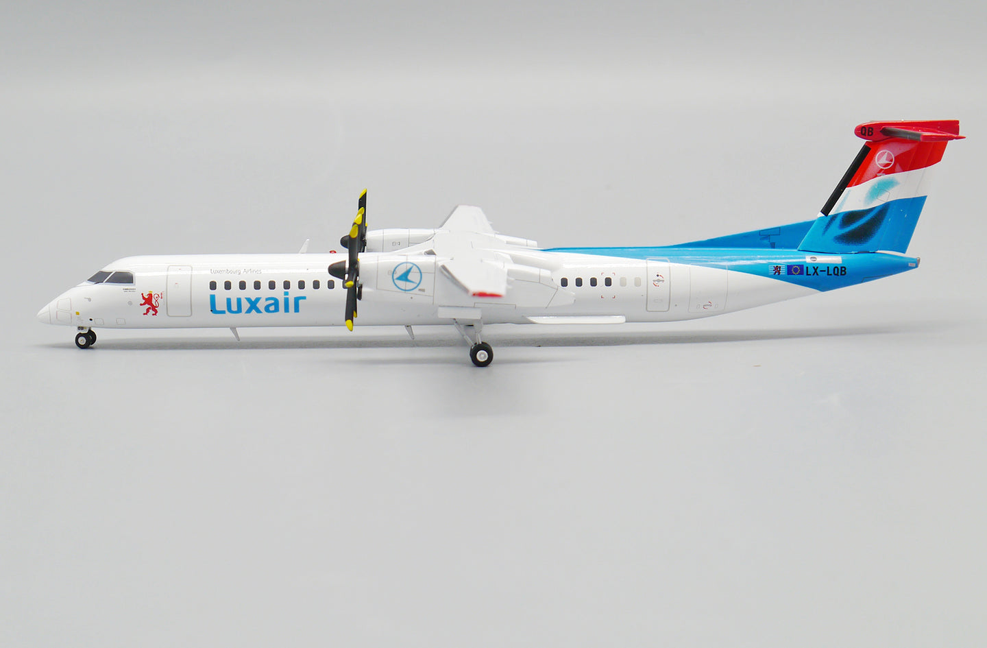 JC WINGS DASH 8-Q400 LUXAIR REG: LX-LQB