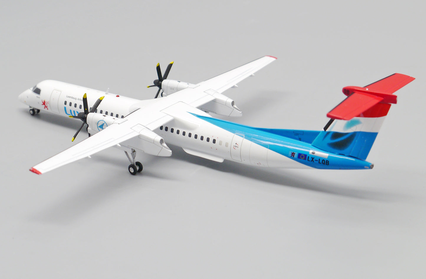 JC WINGS DASH 8-Q400 LUXAIR REG: LX-LQB