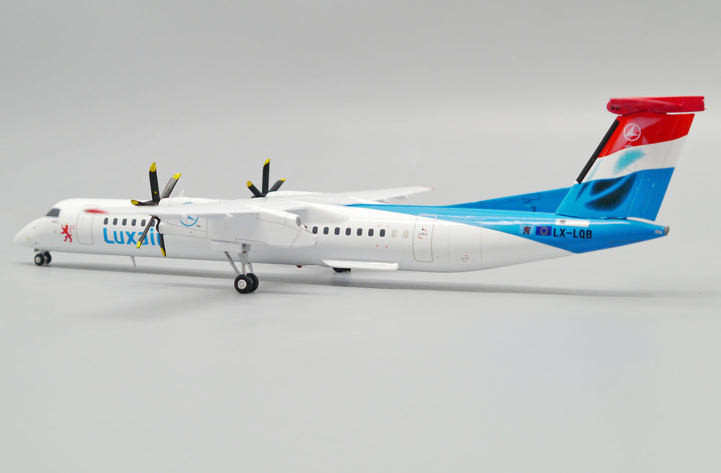 JC WINGS DASH 8-Q400 LUXAIR REG: LX-LQB