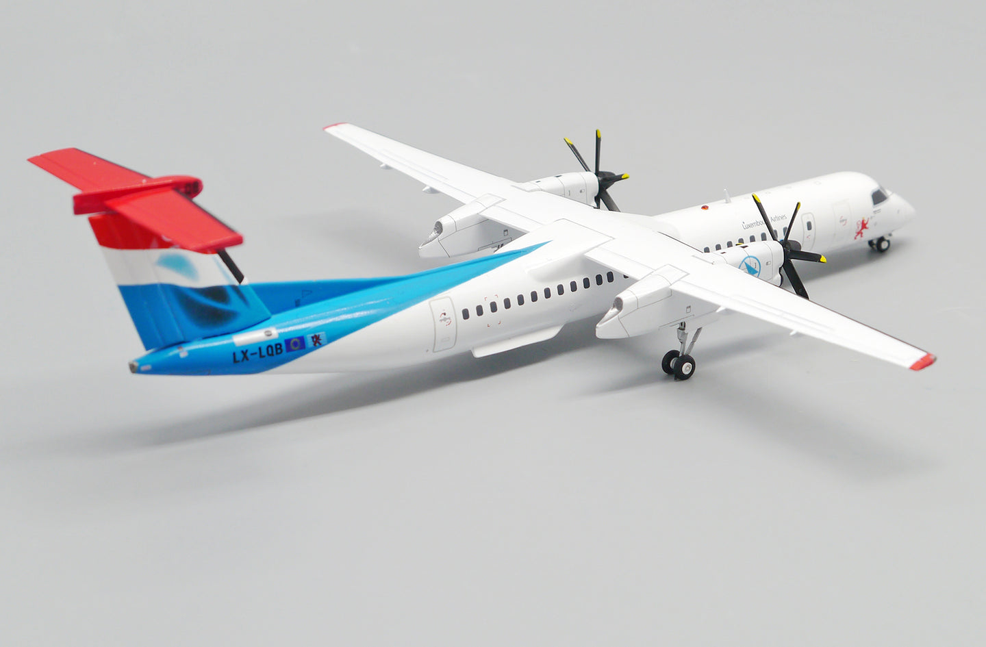 JC WINGS DASH 8-Q400 LUXAIR REG: LX-LQB