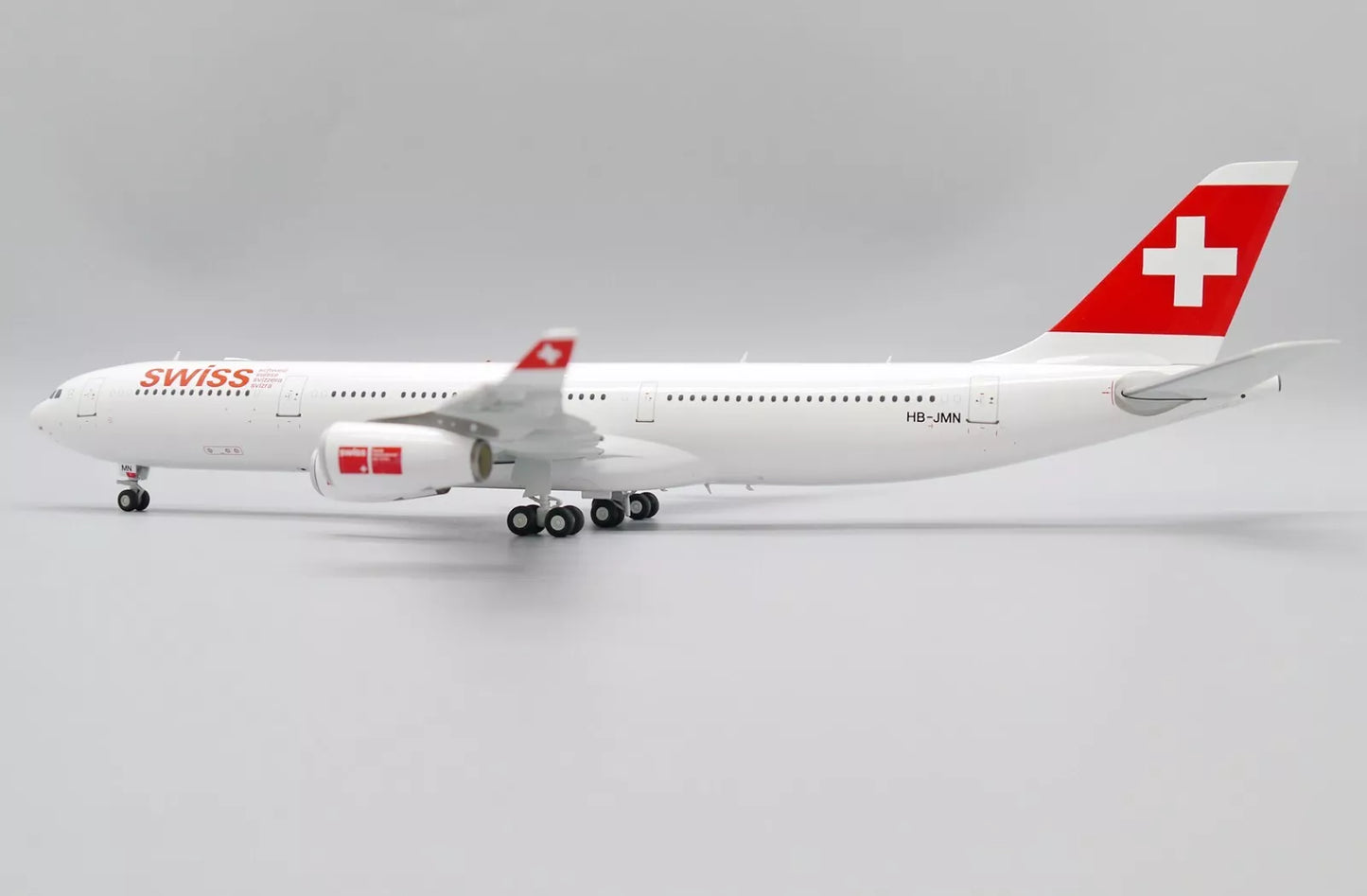 JC WINGS A340-300 SWISS OC REG: HB-JMN