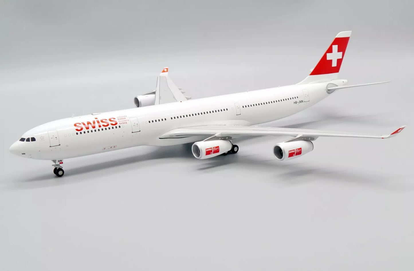 JC WINGS A340-300 SWISS OC REG: HB-JMN