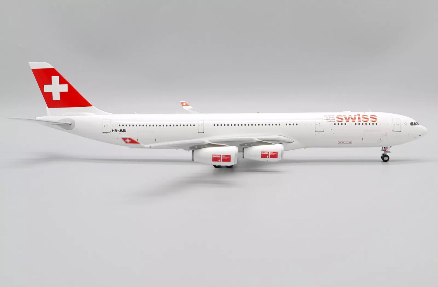 JC WINGS A340-300 SWISS OC REG: HB-JMN