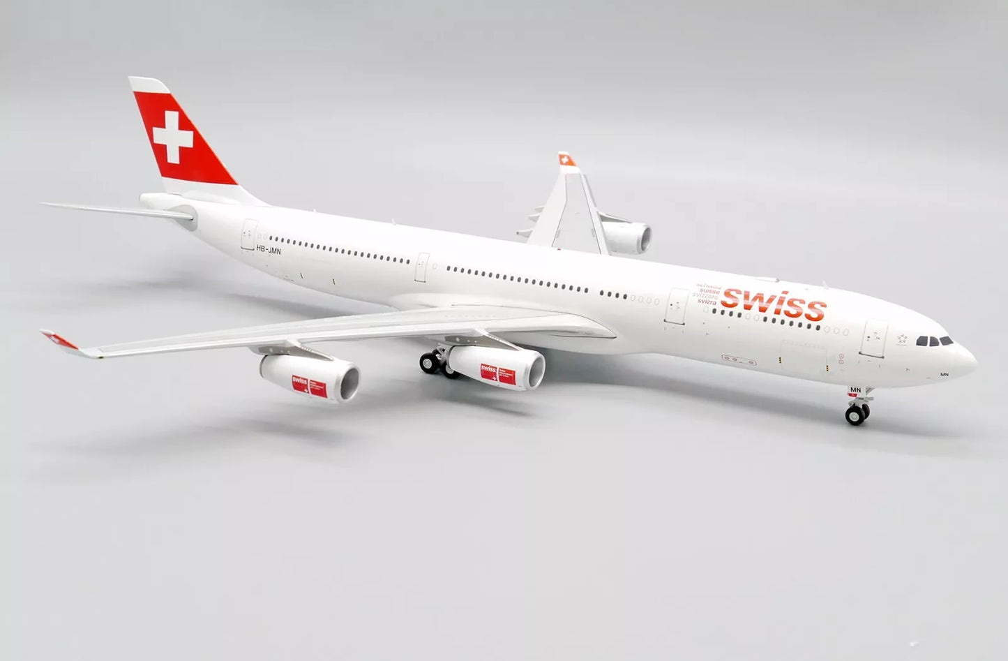 JC WINGS A340-300 SWISS OC REG: HB-JMN