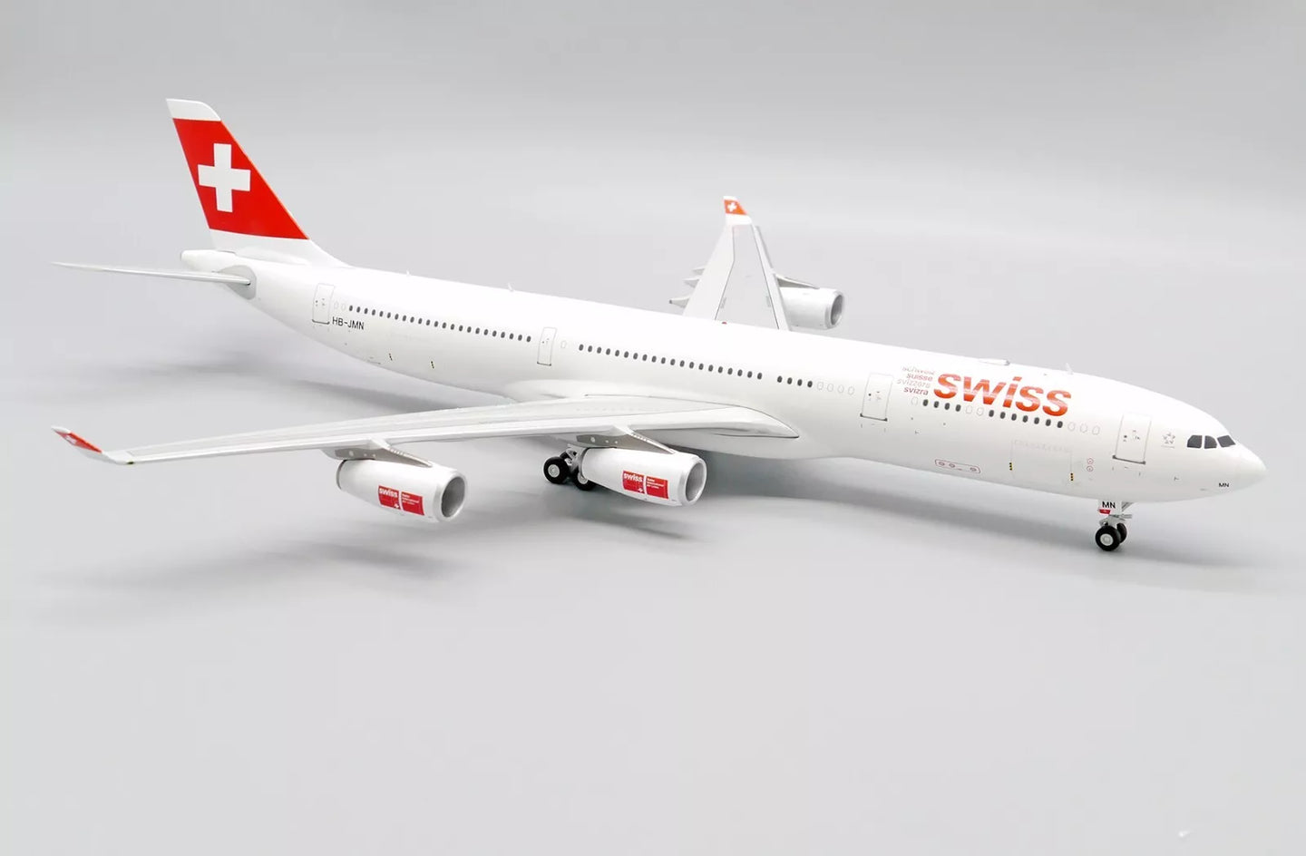 JC WINGS A340-300 SWISS OC REG: HB-JMN