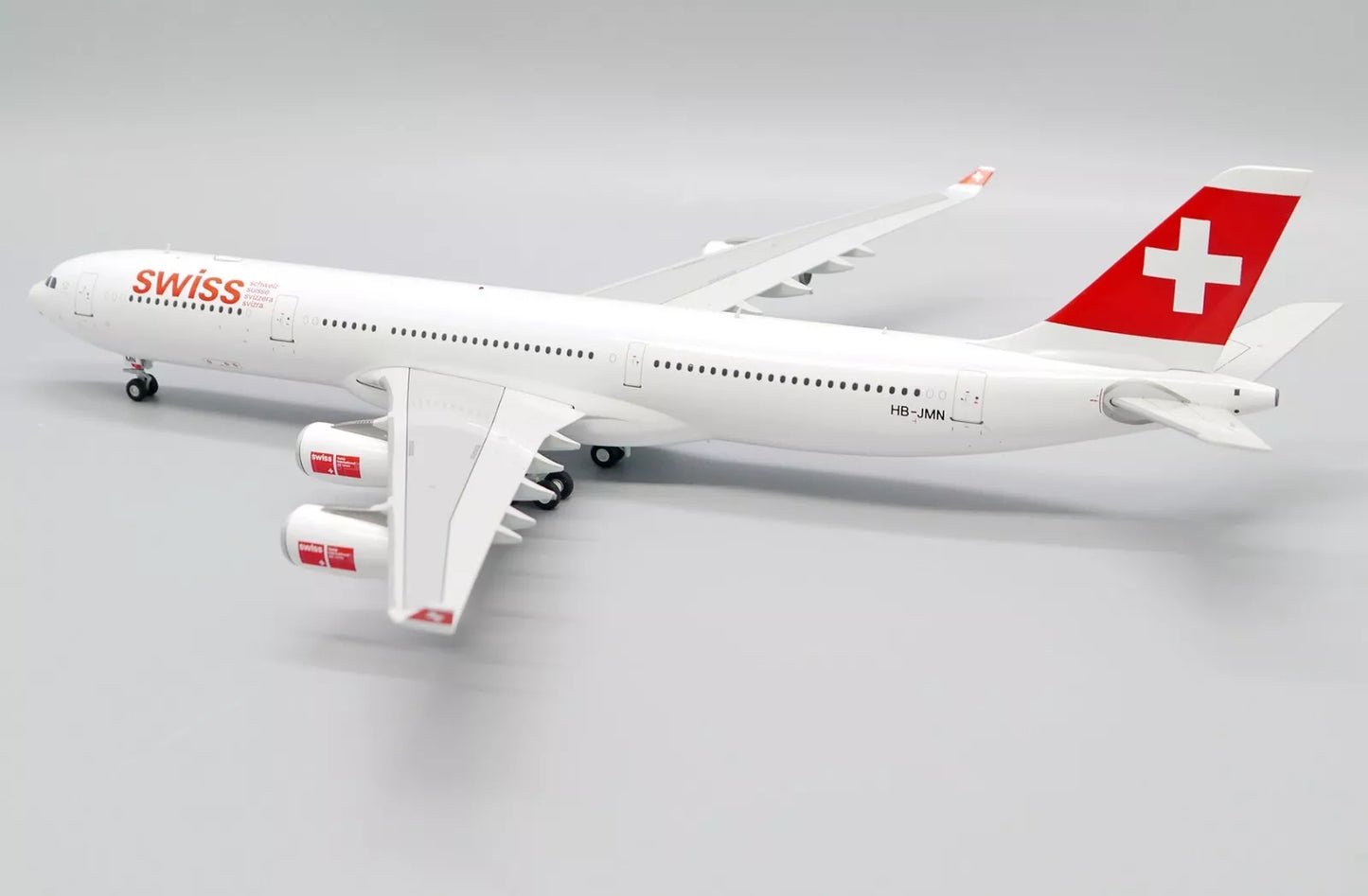 JC WINGS A340-300 SWISS OC REG: HB-JMN