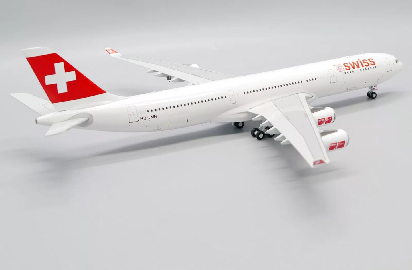 JC WINGS A340-300 SWISS OC REG: HB-JMN
