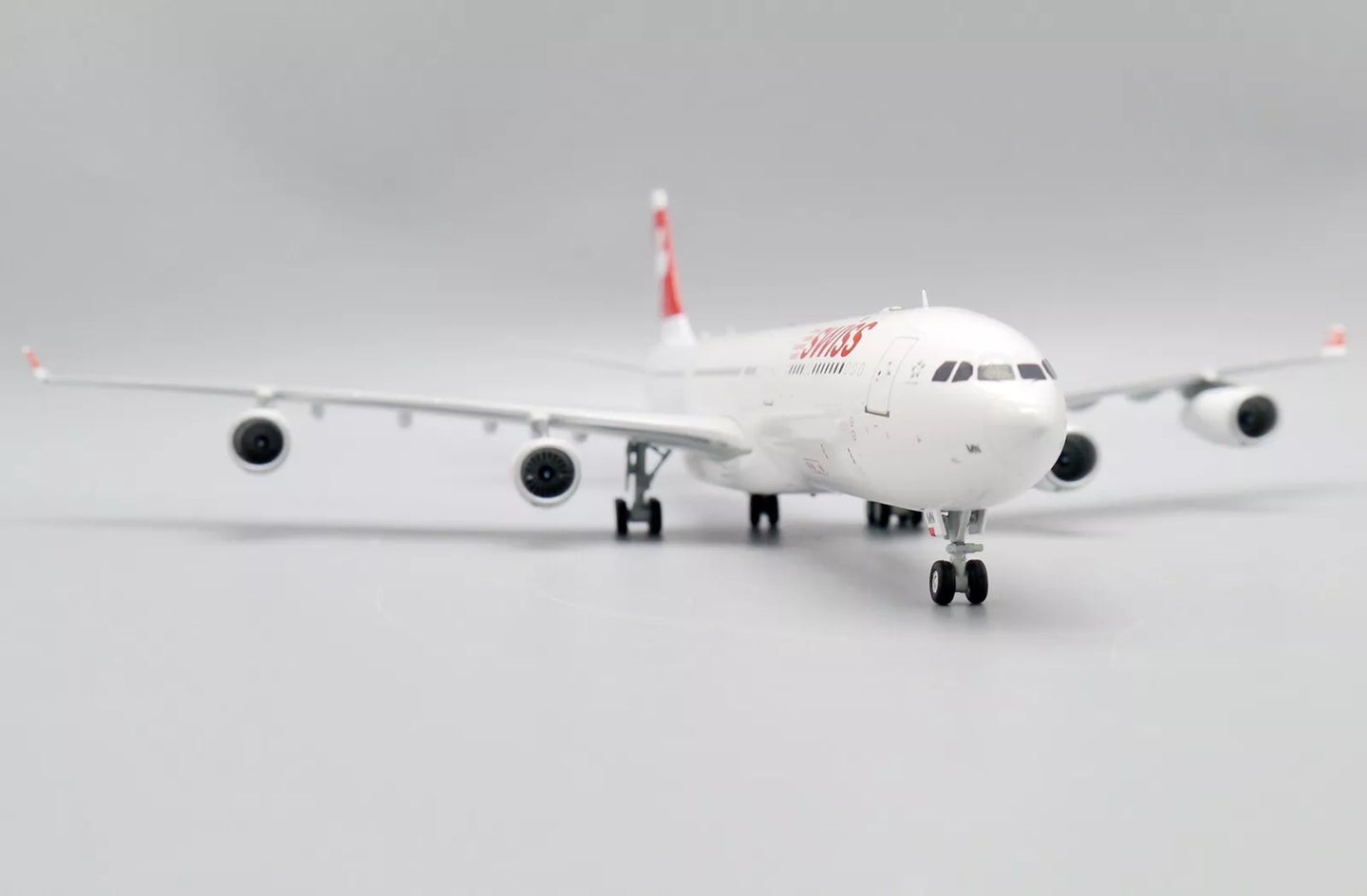 JC WINGS A340-300 SWISS OC REG: HB-JMN