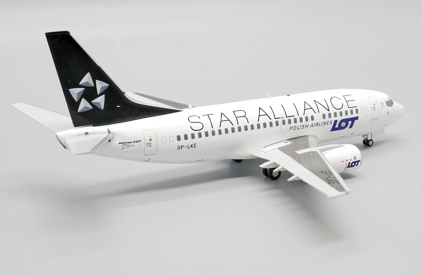 JC WINGS B737-500 LOT POLISH AIRLINES "STAR ALLIANCE" REG: SP-LKE
