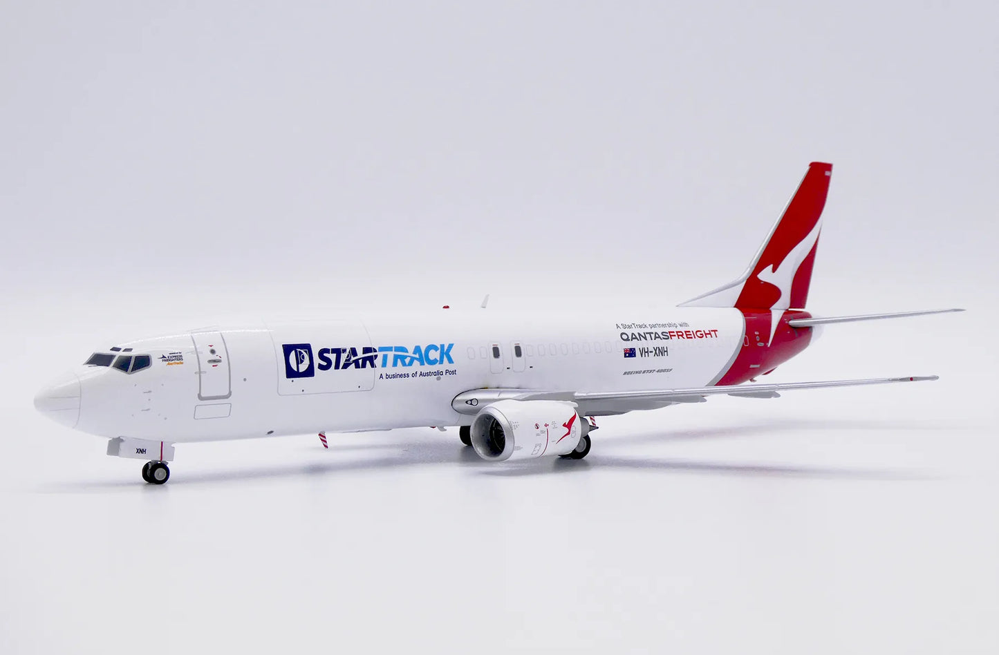JC WINGS B737-400SF QANTAS FREIGHT "STARTRACK" REG: VH-XNH