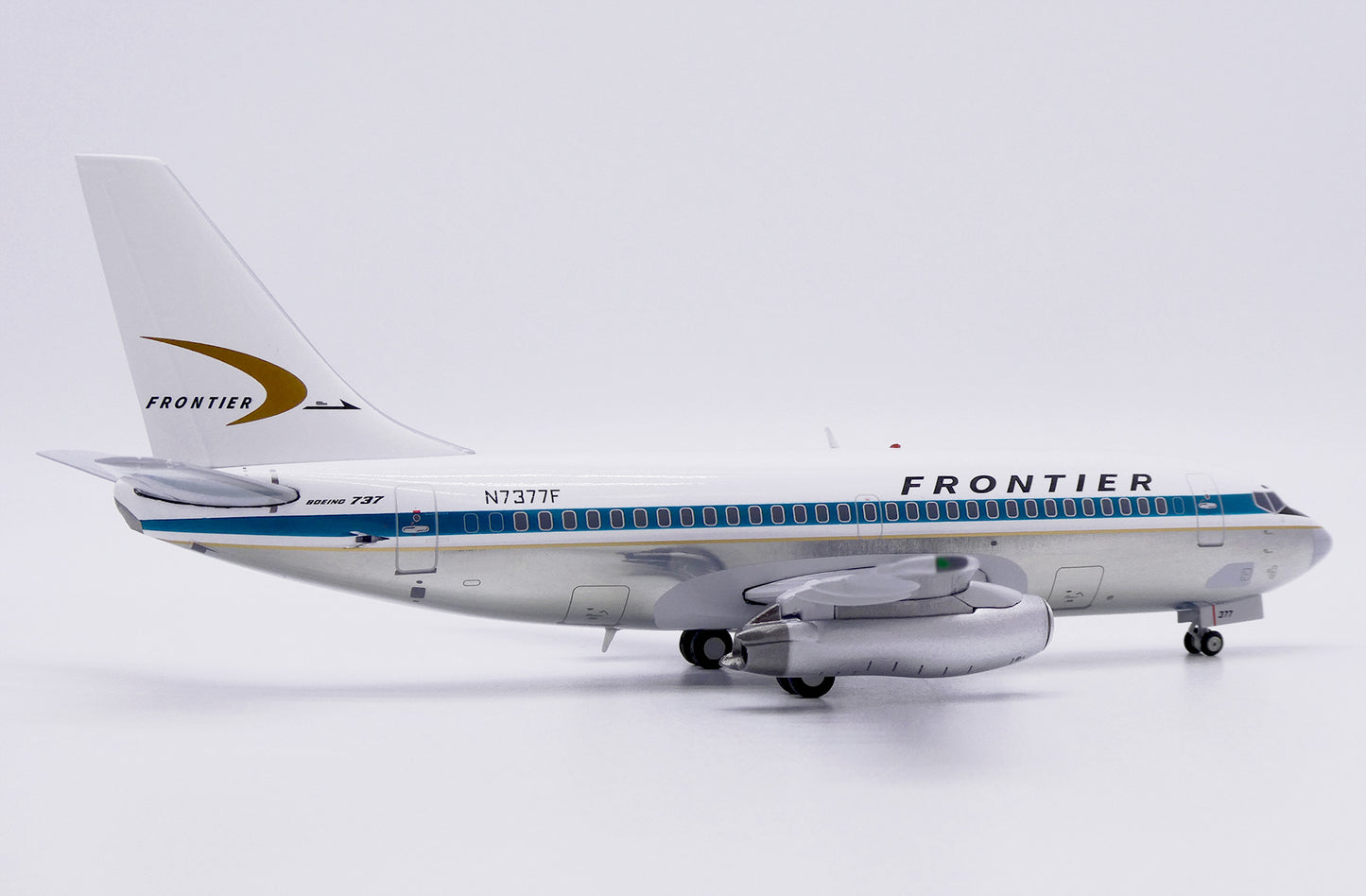 JC WINGS B737-200 FRONTIER AIRLINES (POLISHED) REG: N7377F