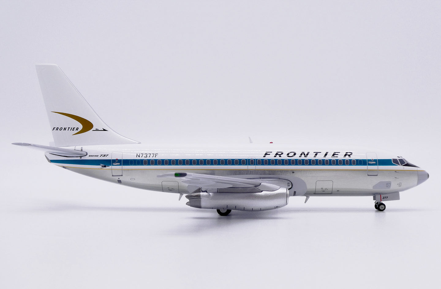 JC WINGS B737-200 FRONTIER AIRLINES (POLISHED) REG: N7377F