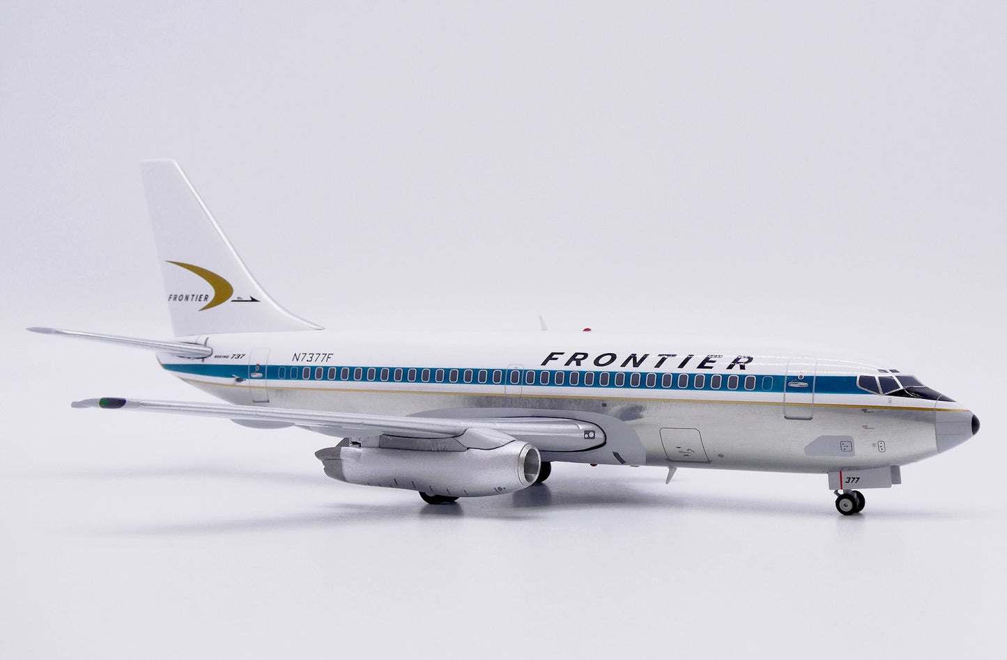 JC WINGS B737-200 FRONTIER AIRLINES (POLISHED) REG: N7377F