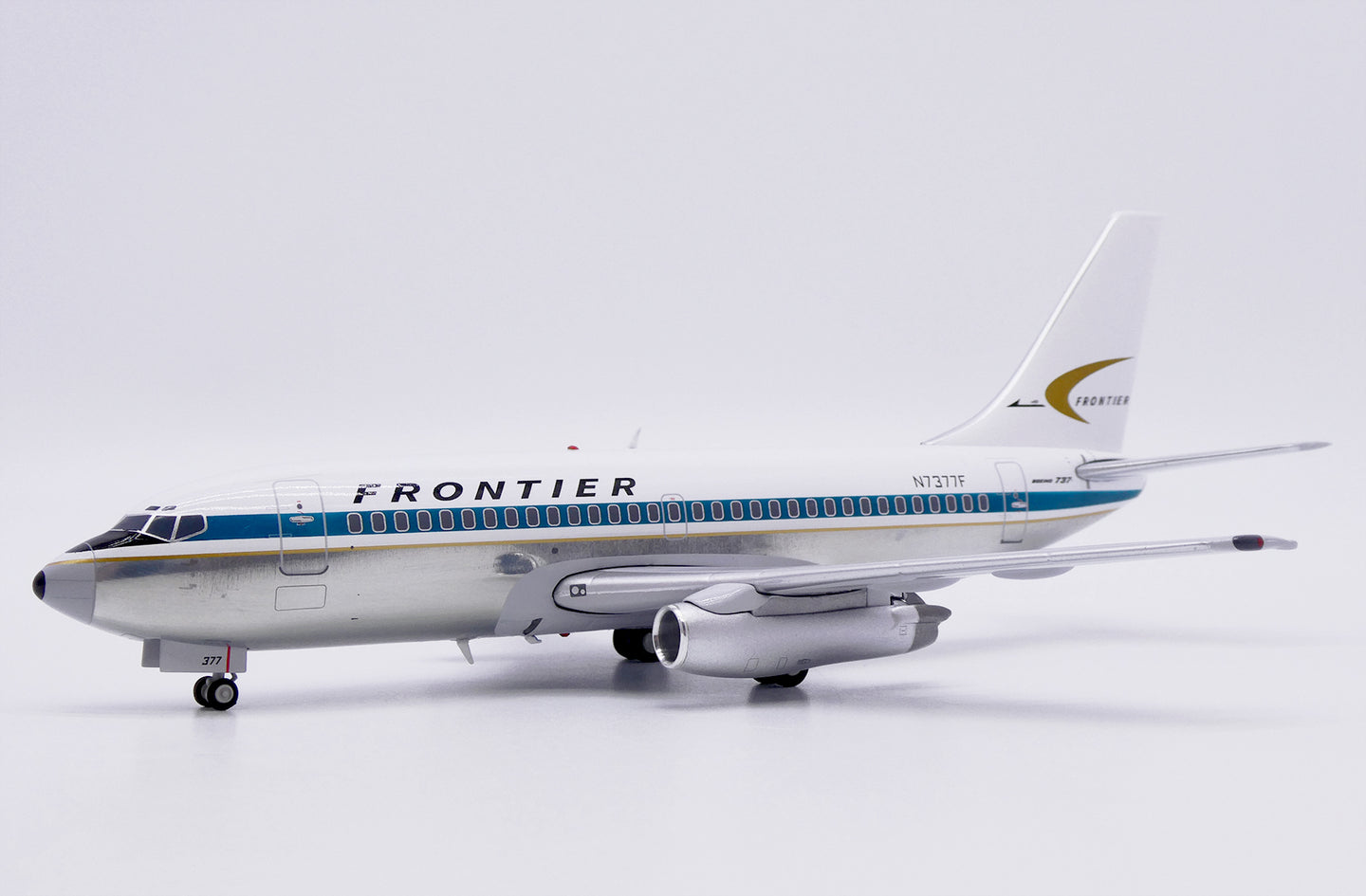 JC WINGS B737-200 FRONTIER AIRLINES (POLISHED) REG: N7377F