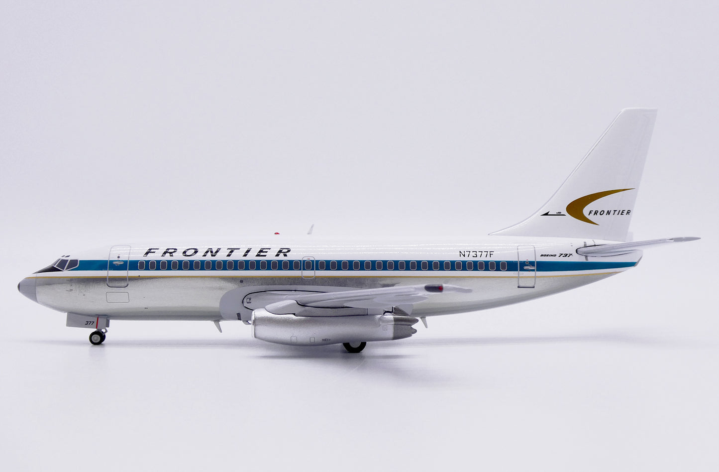 JC WINGS B737-200 FRONTIER AIRLINES (POLISHED) REG: N7377F