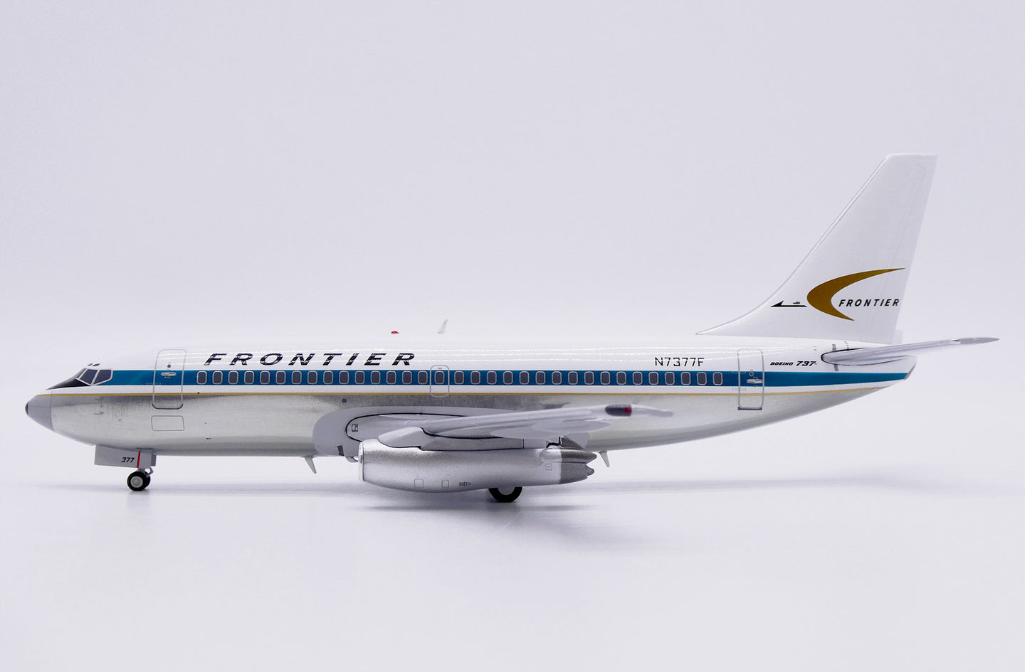 JC WINGS B737-200 FRONTIER AIRLINES (POLISHED) REG: N7377F