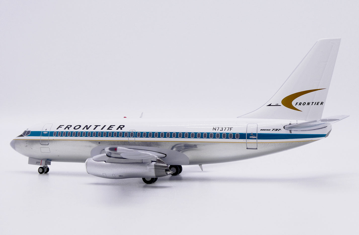 JC WINGS B737-200 FRONTIER AIRLINES (POLISHED) REG: N7377F
