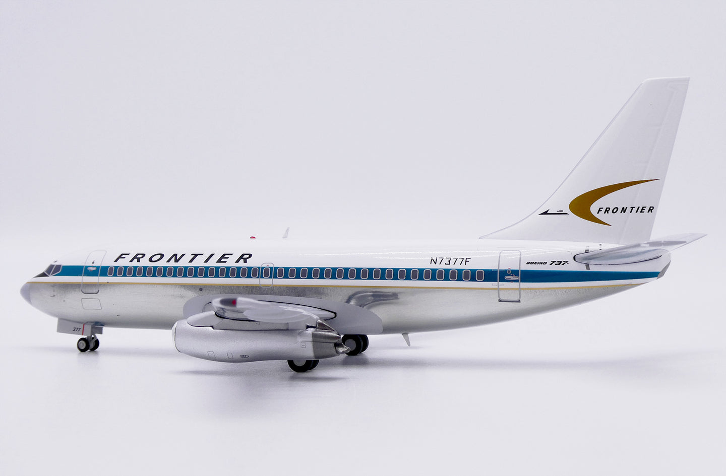 JC WINGS B737-200 FRONTIER AIRLINES (POLISHED) REG: N7377F