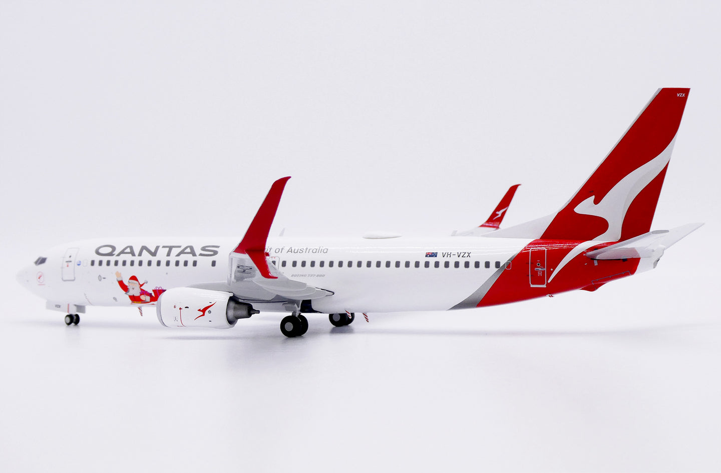 JC WINGS B737-800 QANTAS "SANTA" REG: VH-VZX