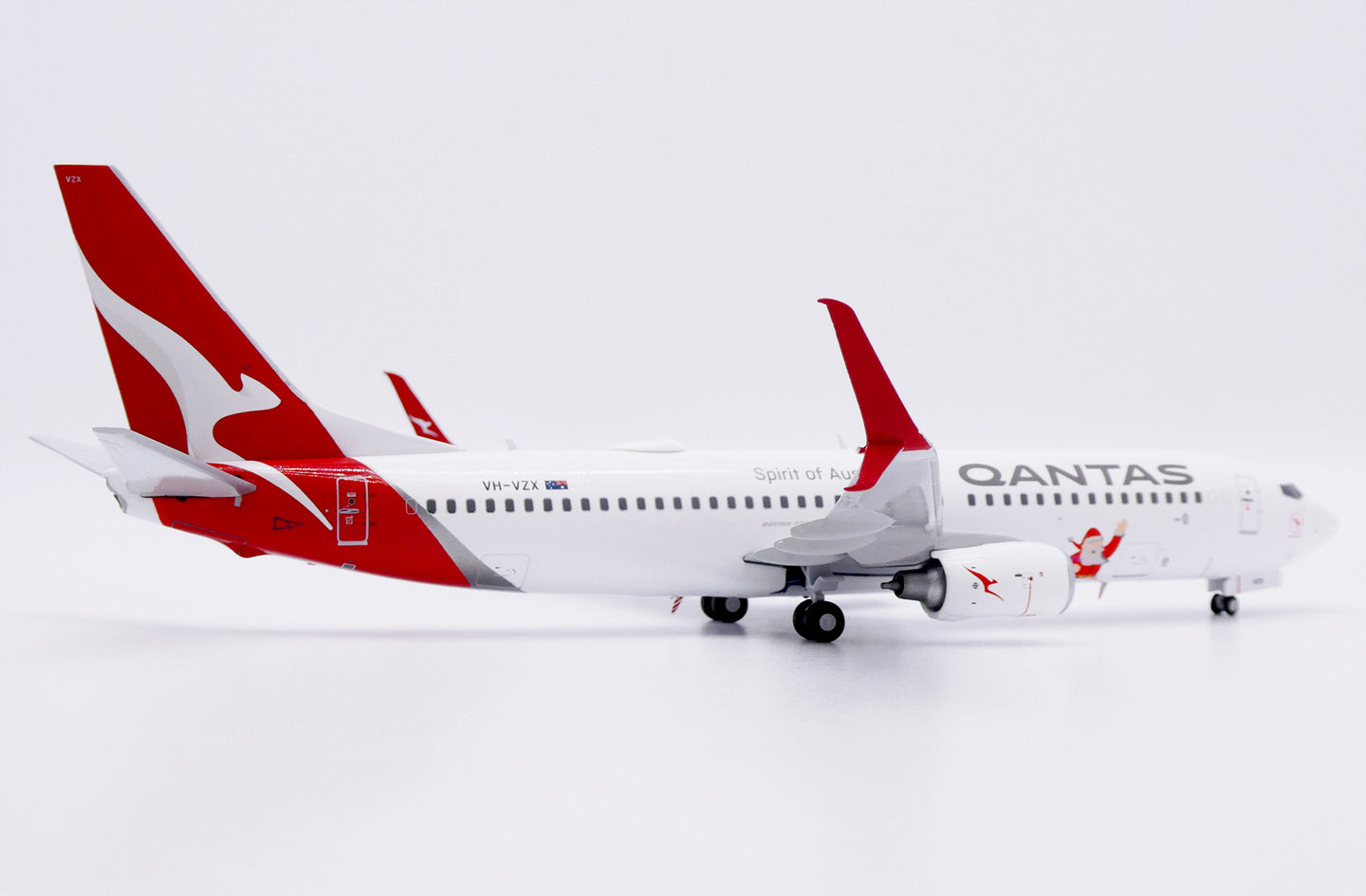 JC WINGS B737-800 QANTAS "SANTA" REG: VH-VZX