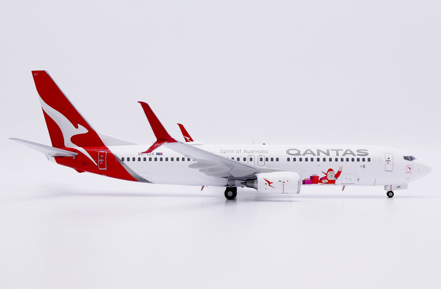 JC WINGS B737-800 QANTAS "SANTA" REG: VH-VZX