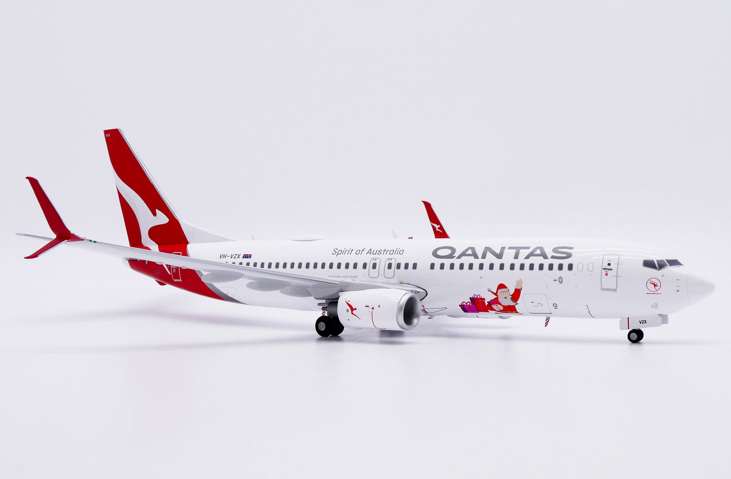 JC WINGS B737-800 QANTAS "SANTA" REG: VH-VZX