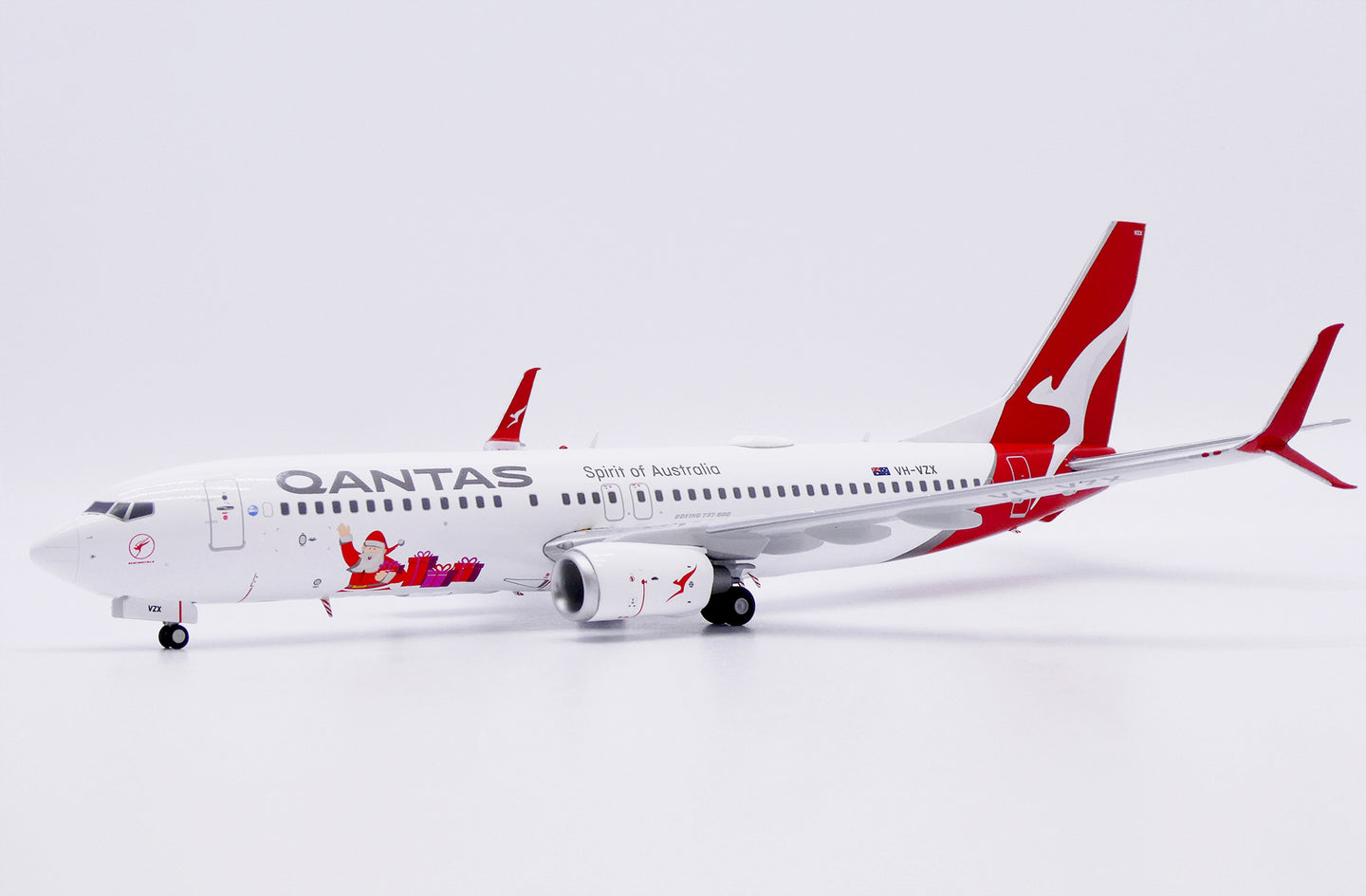 JC WINGS B737-800 QANTAS "SANTA" REG: VH-VZX