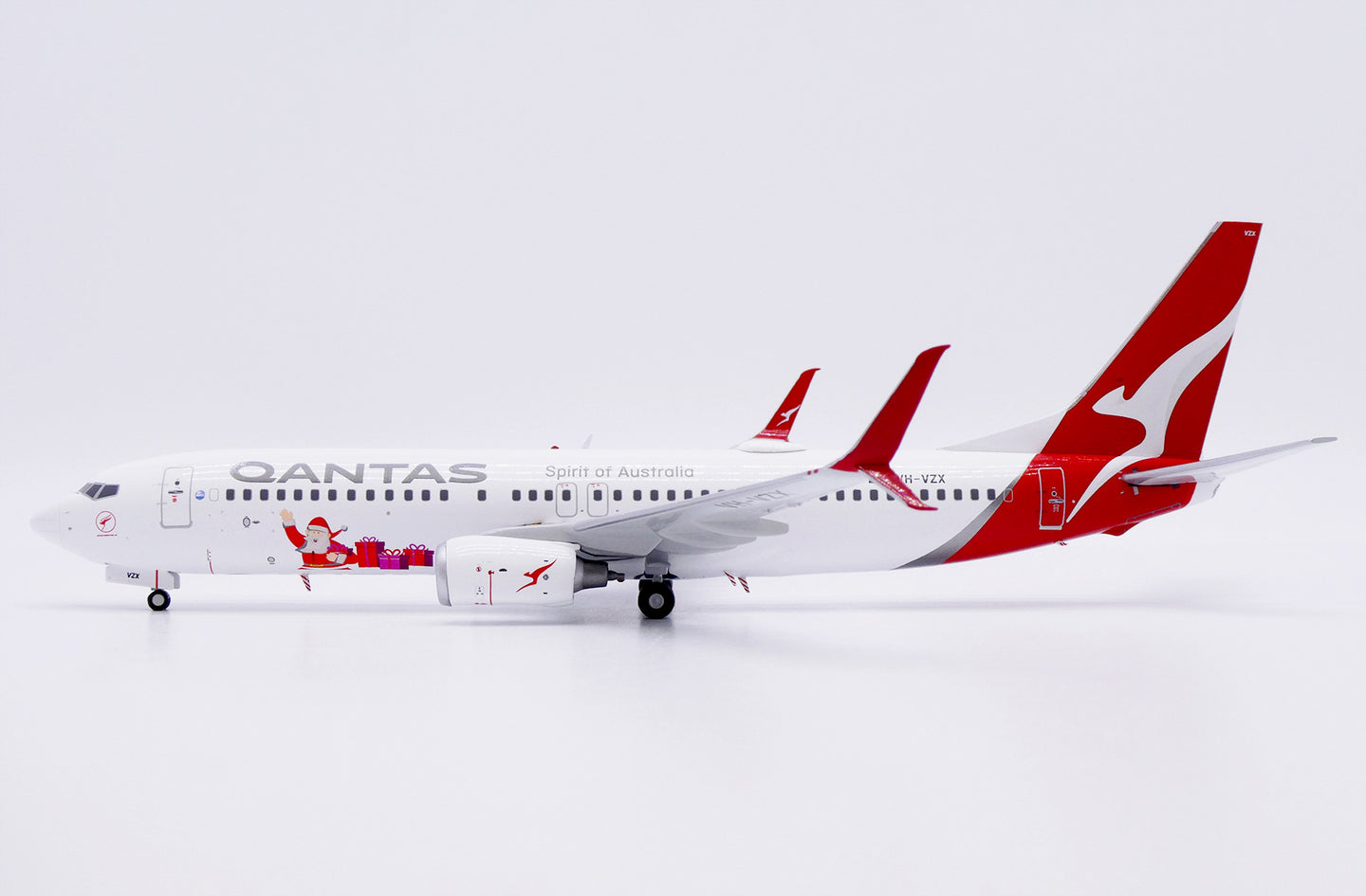 JC WINGS B737-800 QANTAS "SANTA" REG: VH-VZX