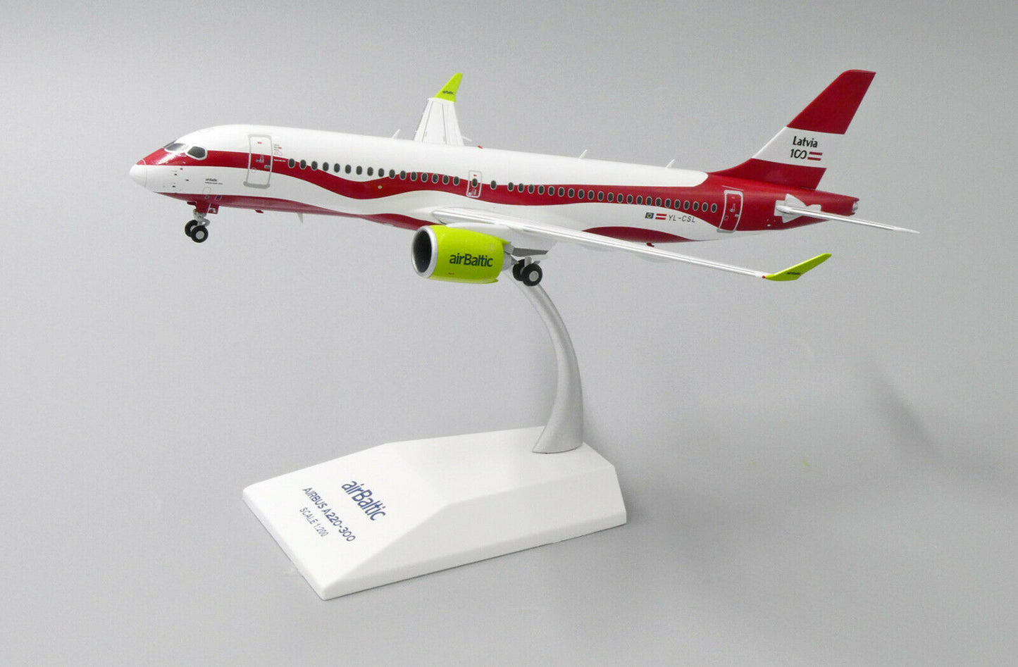 JC WINGS A220 AIR BALTIC "LATVIA 100TH LIVERY" REG: YL-CSL