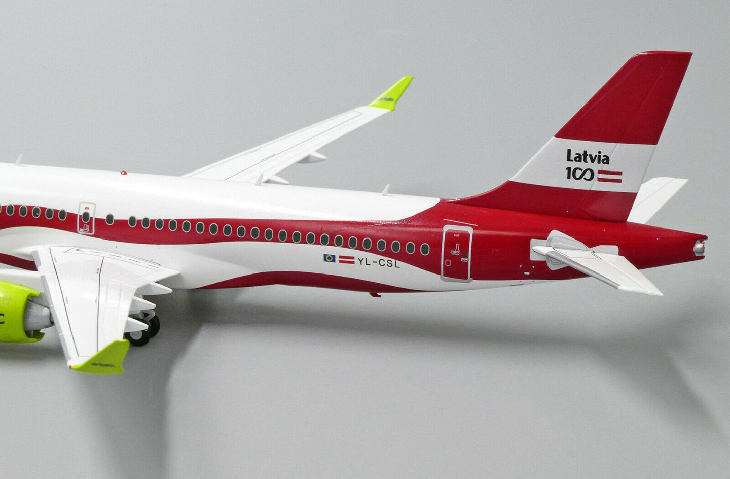JC WINGS A220 AIR BALTIC "LATVIA 100TH LIVERY" REG: YL-CSL