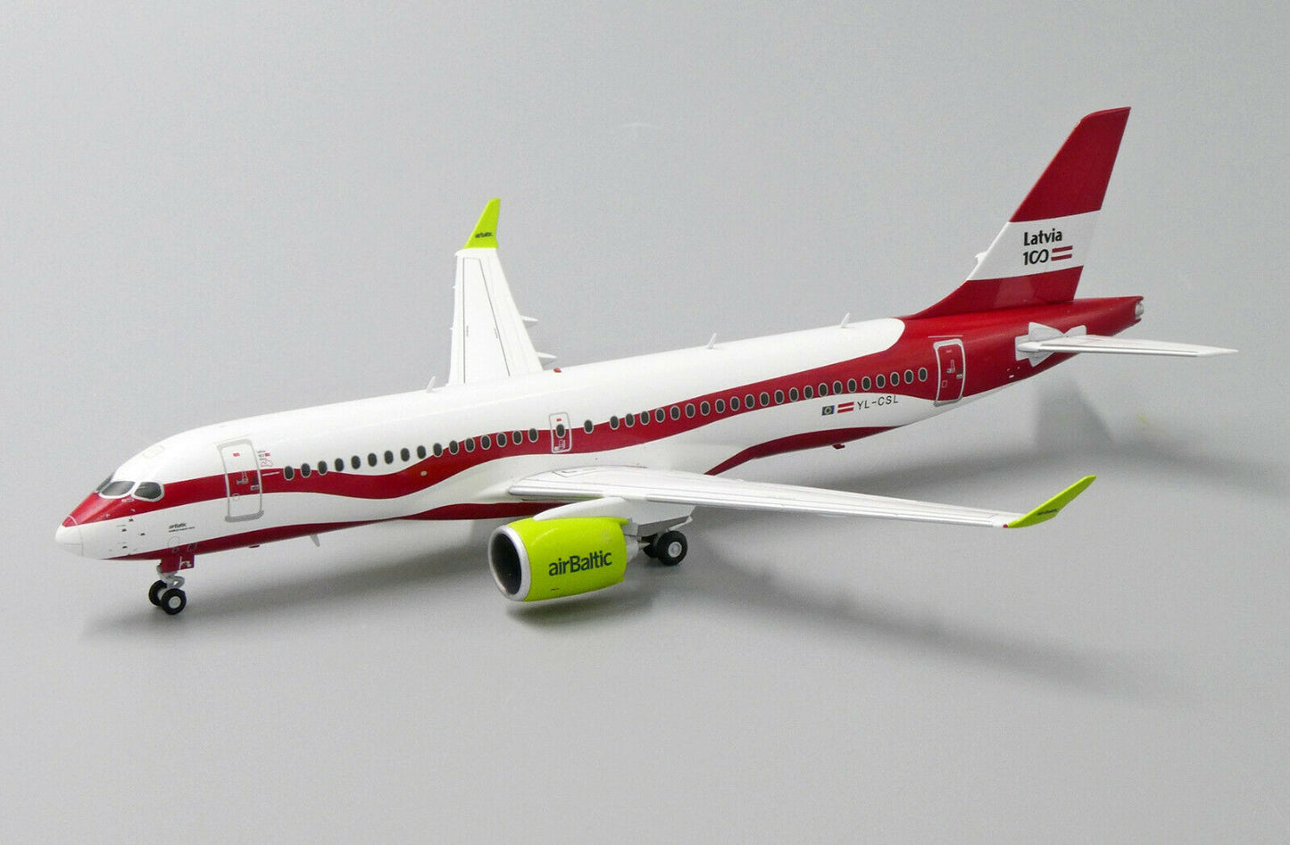 JC WINGS A220 AIR BALTIC "LATVIA 100TH LIVERY" REG: YL-CSL